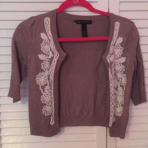 Sweater with white embroidery